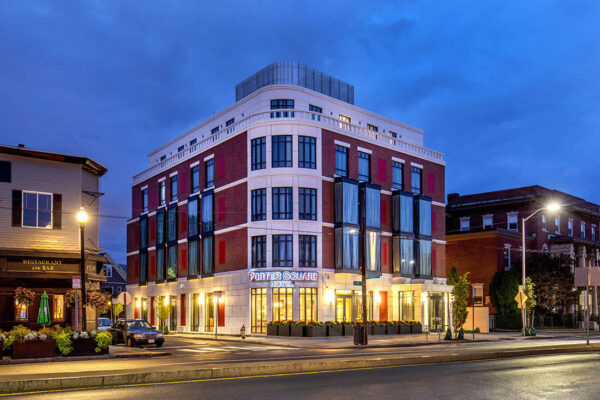 front exterior image of a building at dawn